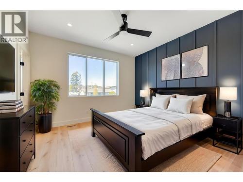 Virtually staged with fun design ideas - 857 Kinnear Court, Kelowna, BC - Indoor Photo Showing Bedroom
