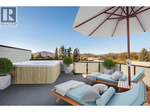 Virtually staged + hot tub ready - 857 Kinnear Court, Kelowna, BC - Outdoor With Deck Patio Veranda With Exterior
