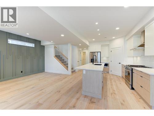open concept - 857 Kinnear Court, Kelowna, BC - Indoor Photo Showing Kitchen With Upgraded Kitchen