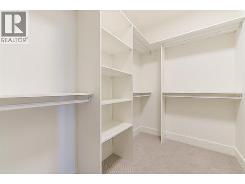 Huge walk in closet - 857 Kinnear Court, Kelowna, BC - Indoor With Storage