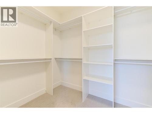 walk in closet - 857 Kinnear Court, Kelowna, BC - Indoor With Storage