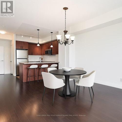 Virtually staged - 1606 - 1 Hurontario Street, Mississauga, ON - Indoor Photo Showing Dining Room