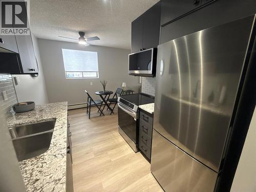 112 17Th  S Avenue Unit# 101, Cranbrook, BC - Indoor Photo Showing Kitchen With Stainless Steel Kitchen With Double Sink