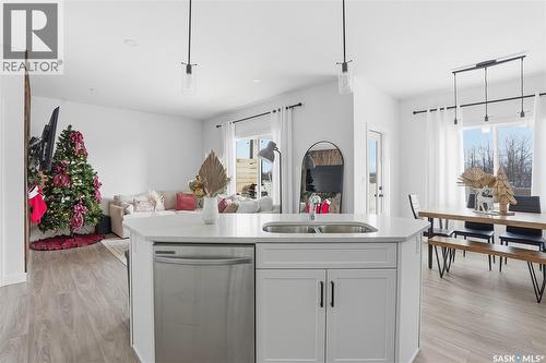 153 Echo Lane, Martensville, SK - Indoor Photo Showing Kitchen With Double Sink