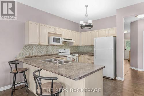 97 Black Bear Way, Ottawa, ON - Indoor Photo Showing Kitchen With Double Sink
