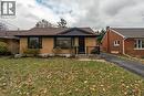 View of front of home featuring brick siding, a porch, a chimney, and a front yard - 266 Melrose Avenue, Kitchener, ON  - Outdoor 