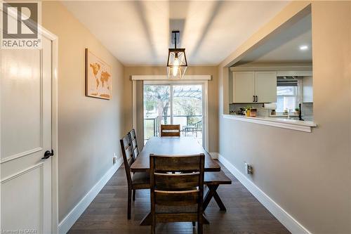 Dining room featuring dark wood-style flooring and plenty of natural light - 266 Melrose Avenue, Kitchener, ON - Indoor