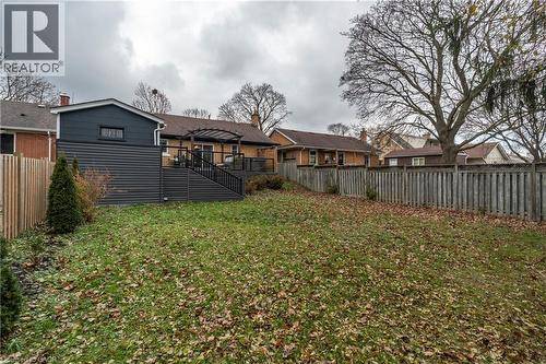 Back of property with a fenced backyard and a wooden deck - 266 Melrose Avenue, Kitchener, ON - Outdoor