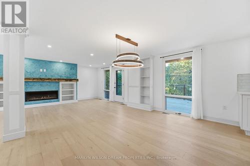 33 Commanche Drive, Ottawa, ON - Indoor Photo Showing Other Room With Fireplace