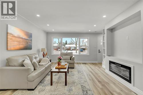 3104 Academy, Windsor, ON - Indoor Photo Showing Living Room With Fireplace