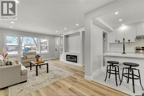 3104 Academy, Windsor, ON - Indoor Photo Showing Living Room With Fireplace