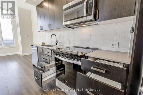 2202 - 3220 William Coltson Avenue, Oakville, ON - Indoor Photo Showing Kitchen With Upgraded Kitchen