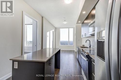 2202 - 3220 William Coltson Avenue, Oakville, ON - Indoor Photo Showing Kitchen With Upgraded Kitchen