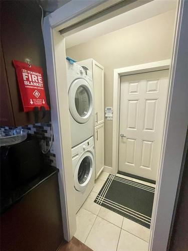20 Bayhill Crescent, Brandon, MB - Indoor Photo Showing Laundry Room