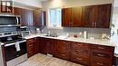 1704 Second Avenue, Rossland, BC  - Indoor Photo Showing Kitchen With Double Sink 