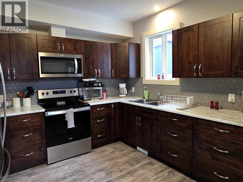 1704 Second Avenue, Rossland, BC - Indoor Photo Showing Kitchen With Double Sink
