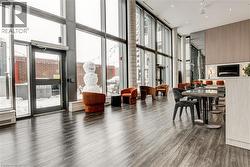 Community lobby featuring a high ceiling and floor to ceiling windows - 