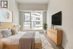 Bedroom featuring light wood-style flooring - 