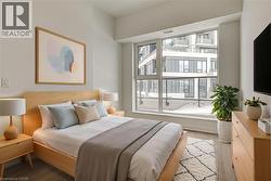 Bedroom featuring wood finished floors - 