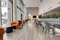 Community lobby featuring a towering ceiling and floor to ceiling windows - 