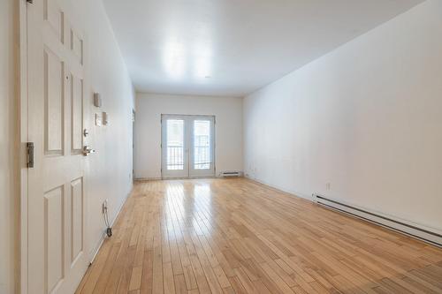 Salon - 202-1080 Rue Anderson, Montréal (Ville-Marie), QC - Indoor Photo Showing Other Room