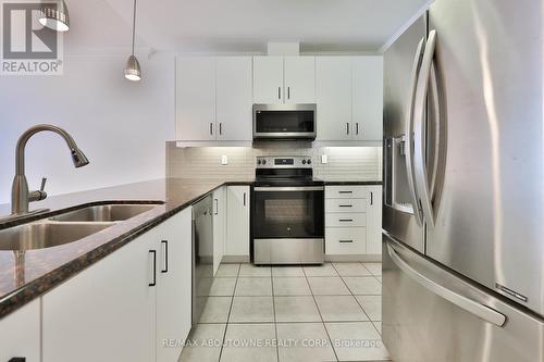 509 - 1980 Imperial Way, Burlington, ON - Indoor Photo Showing Kitchen With Stainless Steel Kitchen With Double Sink With Upgraded Kitchen