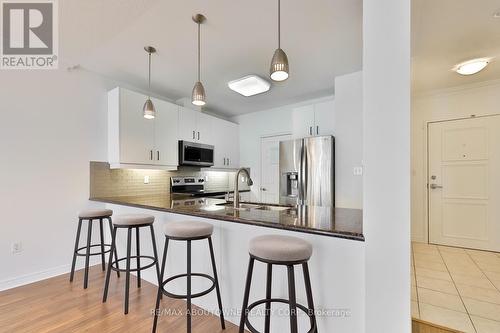 Virtually Staged - 509 - 1980 Imperial Way, Burlington, ON - Indoor Photo Showing Kitchen With Stainless Steel Kitchen With Upgraded Kitchen