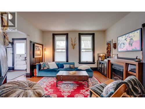 3102 Pleasant Valley Road, Vernon, BC - Indoor Photo Showing Living Room With Fireplace