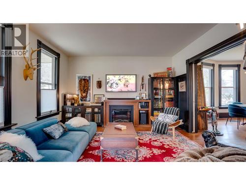 3102 Pleasant Valley Road, Vernon, BC - Indoor Photo Showing Living Room With Fireplace