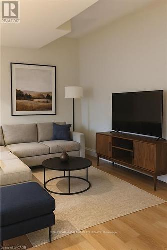 Virtually staged - 2 - 4 Bankfield Crescent, Hamilton, ON - Indoor Photo Showing Living Room
