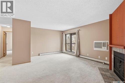 303 205 Kingsmere Boulevard, Saskatoon, SK - Indoor With Fireplace