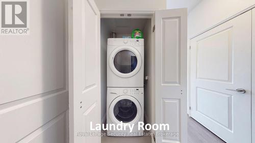 #403 - 25 Fontenay Court, Toronto, ON - Indoor Photo Showing Laundry Room