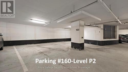 #403 - 25 Fontenay Court, Toronto, ON - Indoor Photo Showing Garage