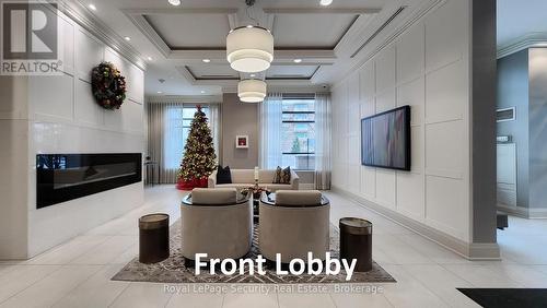 #403 - 25 Fontenay Court, Toronto, ON - Indoor Photo Showing Other Room With Fireplace