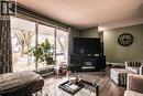 132 Nagel Crescent, Regina, SK  - Indoor Photo Showing Living Room 