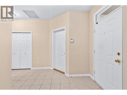 Front door and garage door - 3360 Old Okanagan Highway Unit# 160, West Kelowna, BC - Indoor Photo Showing Other Room
