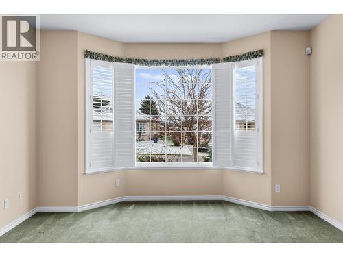 Bay window and california style shutters - 3360 Old Okanagan Highway Unit# 160, West Kelowna, BC - Indoor Photo Showing Other Room