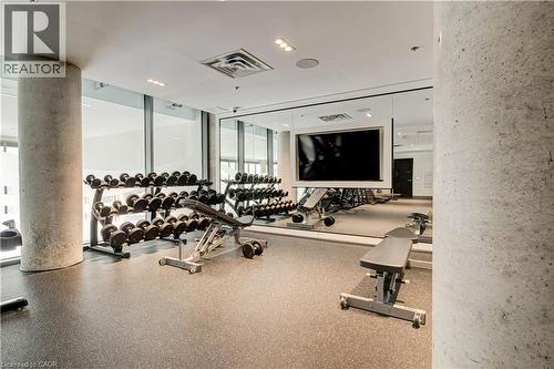 Workout area with floor to ceiling windows - 25 Wellington Street A S Unit# 209, Kitchener, ON - Indoor Photo Showing Gym Room