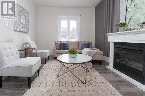 50 Stapleton Avenue, Hamilton, ON - Indoor Photo Showing Living Room With Fireplace