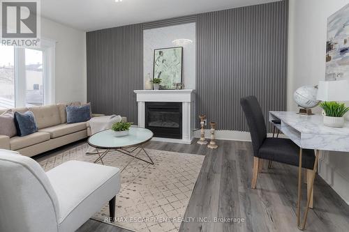 50 Stapleton Avenue, Hamilton, ON - Indoor Photo Showing Living Room With Fireplace