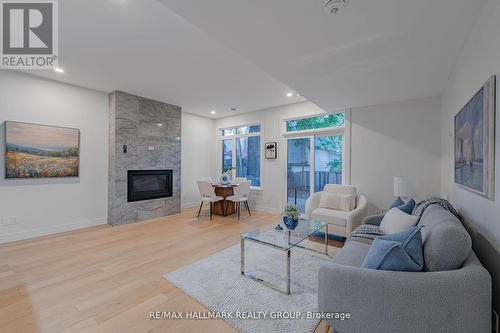 14 Thornton Avenue, Ottawa, ON - Indoor Photo Showing Living Room With Fireplace