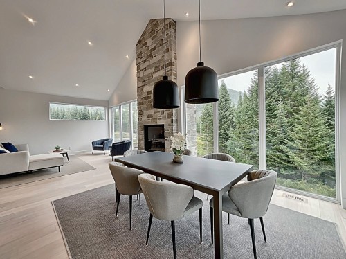Salle à manger - 1116 Ch. Du Massif, Piedmont, QC - Indoor Photo Showing Dining Room With Fireplace