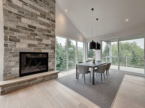 Salle à manger - 1116 Ch. Du Massif, Piedmont, QC - Indoor With Fireplace