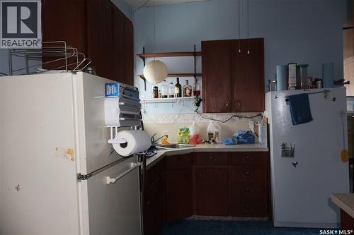 210 1St Avenue, Sutton Rm No. 103, SK - Indoor Photo Showing Kitchen With Double Sink