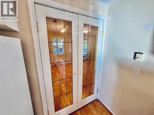 French Doors between Kitchen/LR - 501 Arthur Street, Slocan, BC - Indoor Photo Showing Other Room