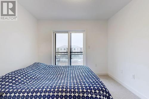 95 - 940 St David Street N, Centre Wellington, ON - Indoor Photo Showing Bedroom