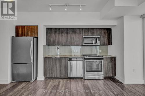 Ph-07 - 30 Shore Breeze Drive, Toronto, ON - Indoor Photo Showing Kitchen With Stainless Steel Kitchen