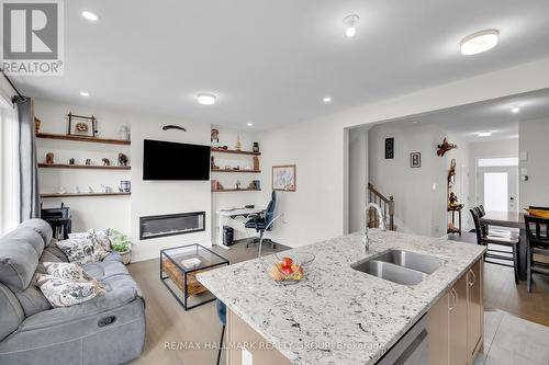 1076 Curraglass Walk, Ottawa, ON - Indoor With Fireplace