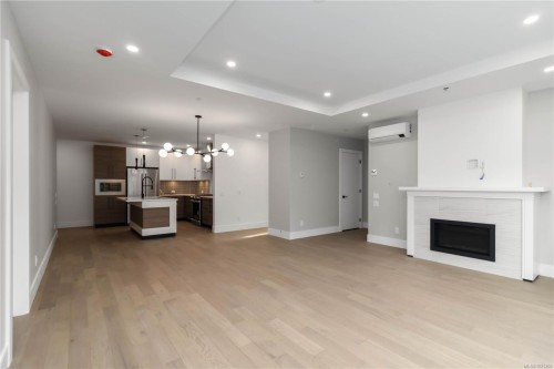 101-986 Doumac Ave, Saanich, BC - Indoor Photo Showing Living Room With Fireplace