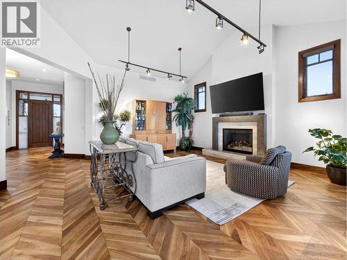 132 Sky Court, Kelowna, BC - Indoor Photo Showing Living Room With Fireplace